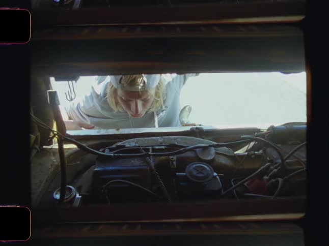 A footage of a person operating on an engine