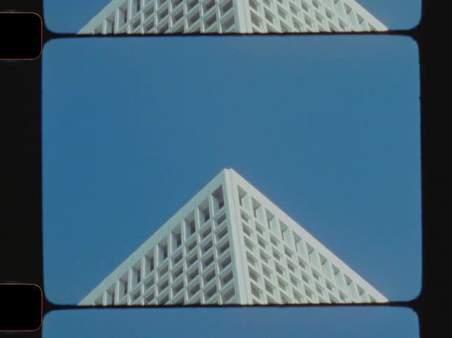 The top corner of a large building