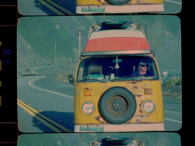 A footage of a person driving a yellow bus