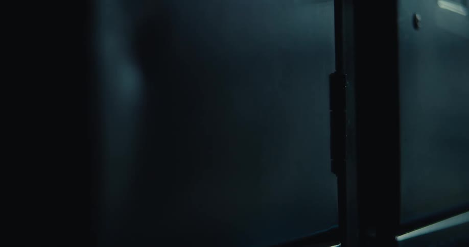 A shadow of a person passes by the locker