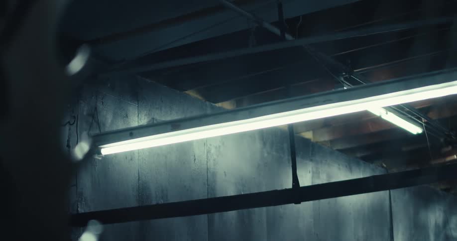 The lights of a building turn off at night