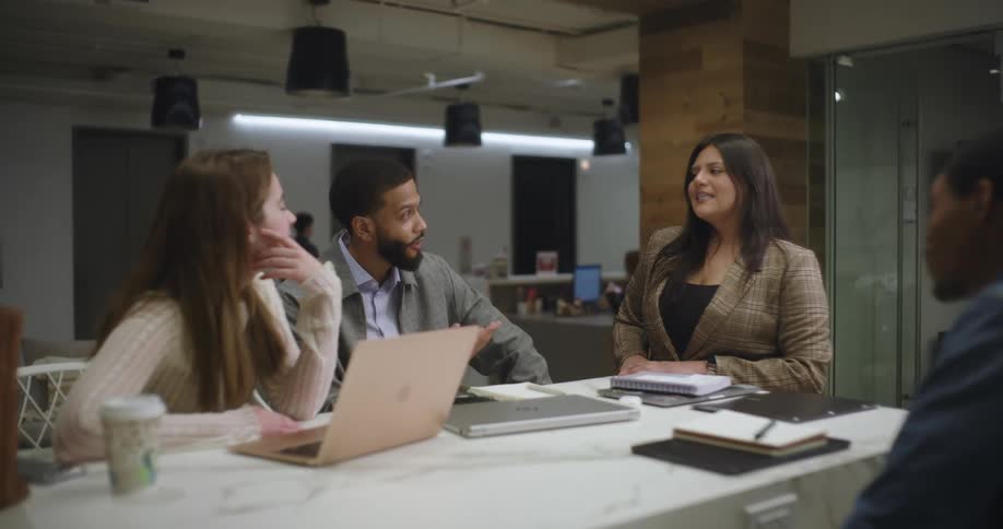People are talking during a meeting in the office