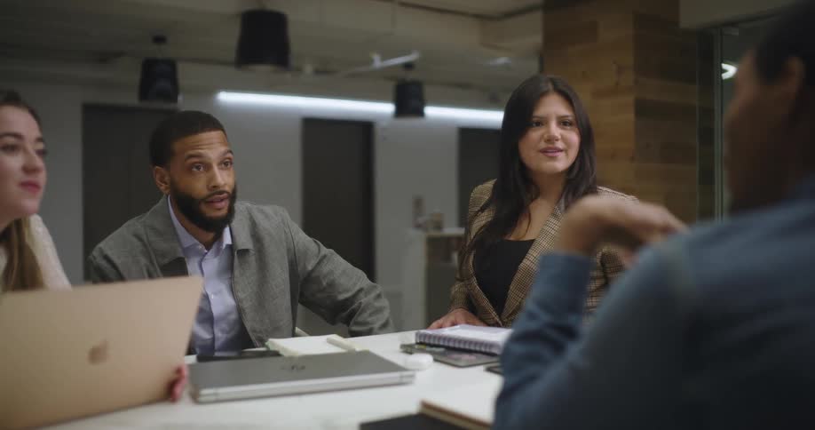 People ask questions during a meeting