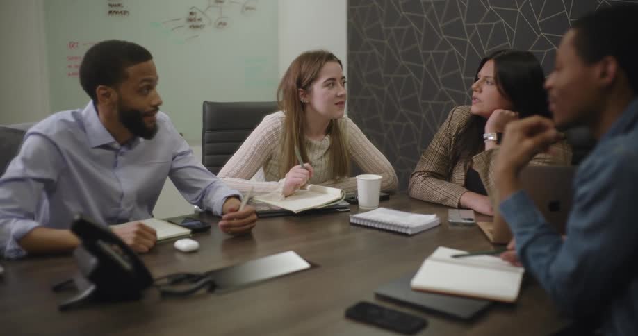 A footage of coworkers having a conversation