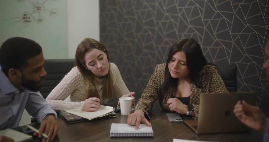 Guys talking in an office