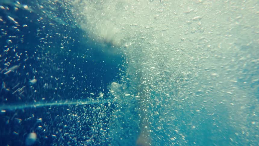 Child diving into the pool