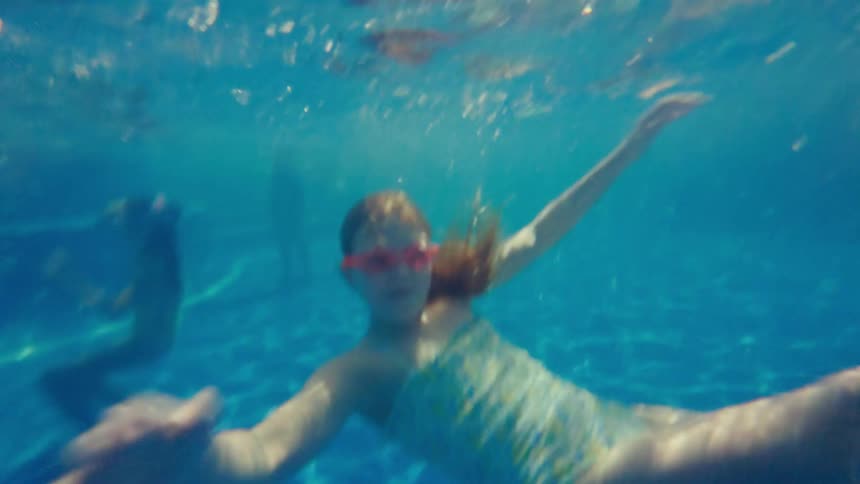 A footage of a teenager swimming