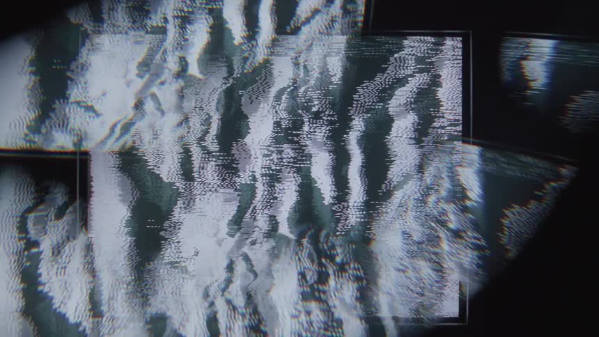 An abstract art piece similar to television static shows monochrome squiggles and zigzags