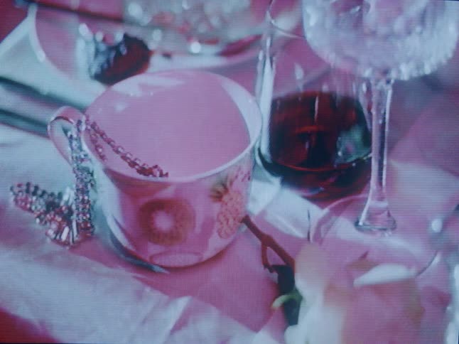A glass of wine is on the table