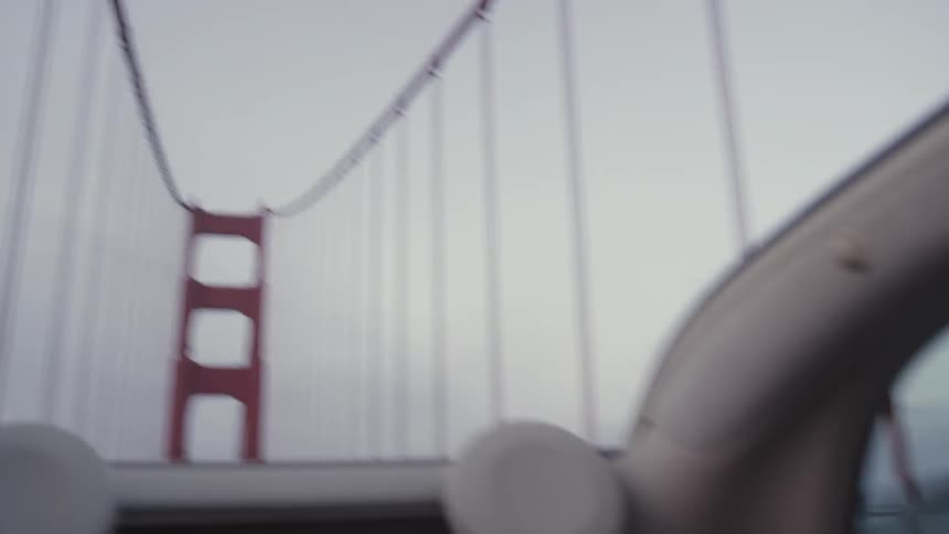 Woman drives car across golden gate bridge