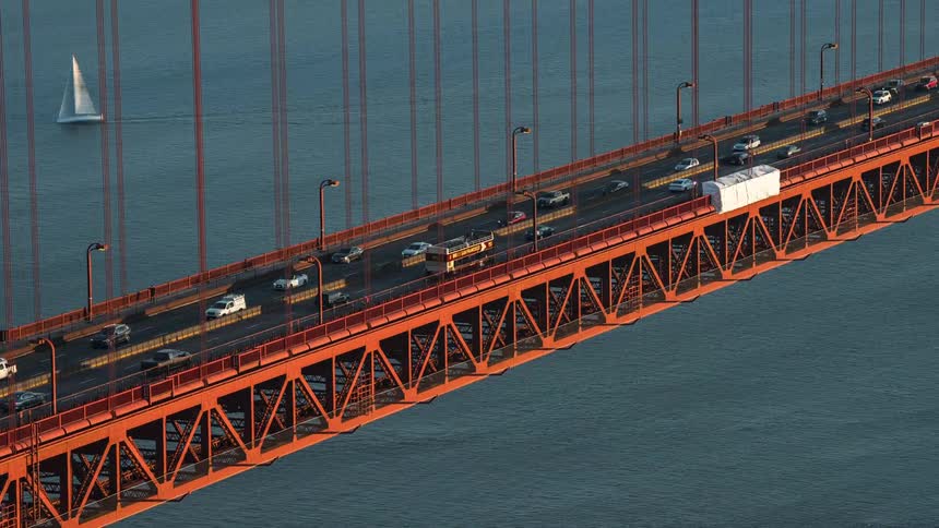 Heavy traffic is crossing the bridge