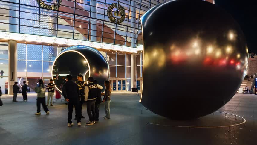 People enjoy the nightlife both outside and inside the chase center