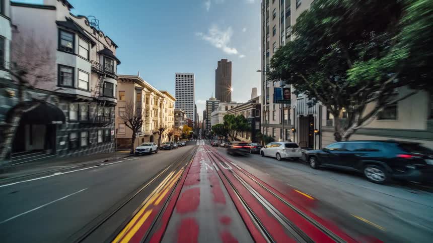 Traffic and pedestrians travel in the city