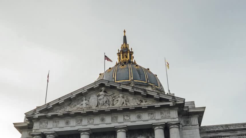 Traffic surrounds the landmark building