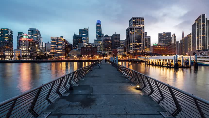 View over a small bridge to a big bright city