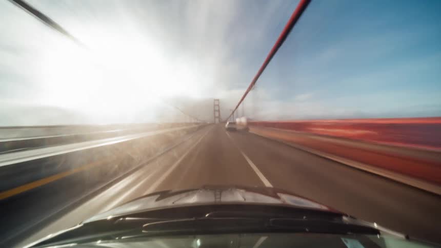 View from a car of a road on a bridge
