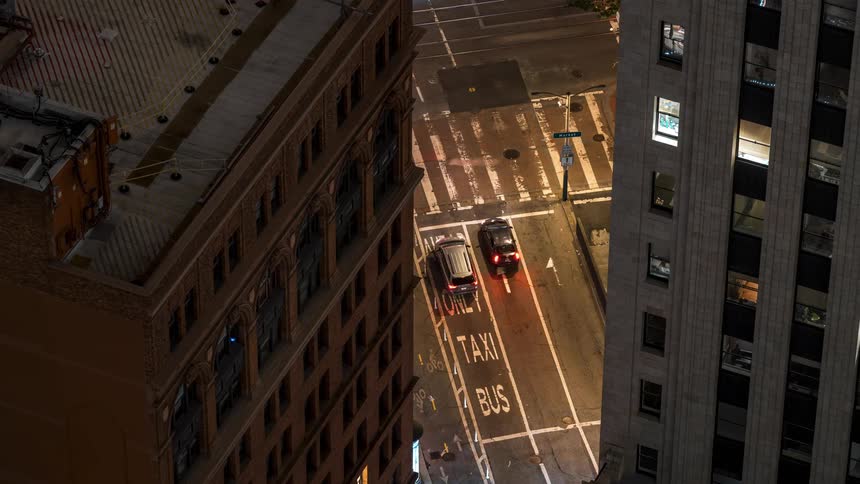 View from above to a street with lots of traffic and lights