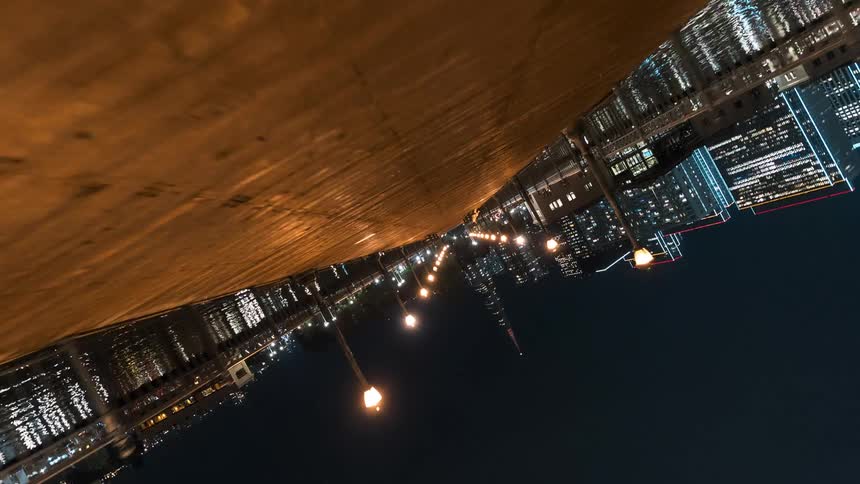 Twisting 360 degrees to show a city skyline upside down before going right side up again