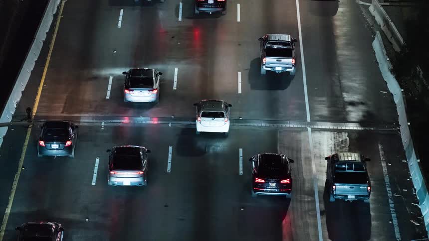 Cars on a road with many lanes