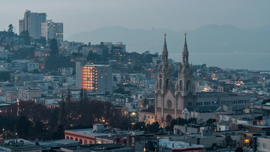 View of a large city with a church