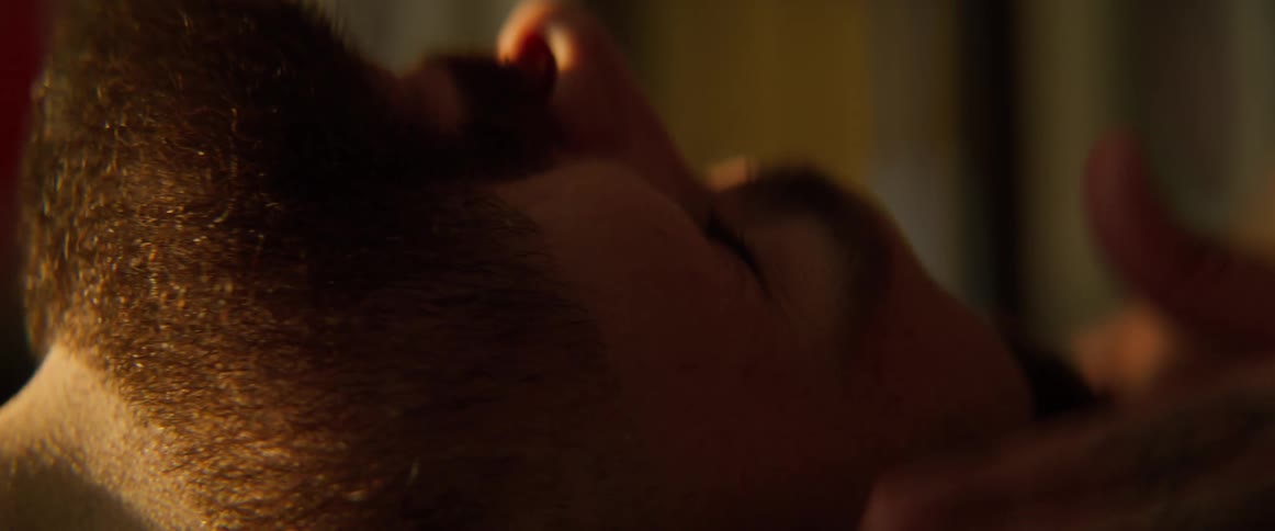 A barber is massaging the mans head