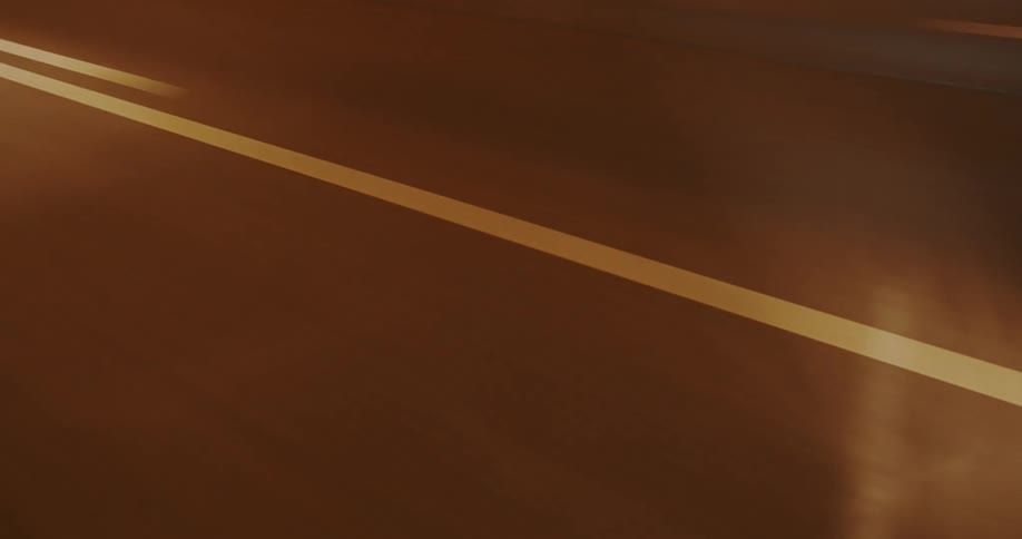 Light reflects on the road
