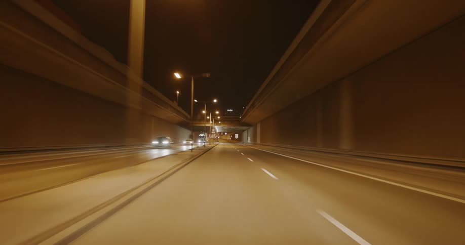 View inside a tunnel street in the city and then view to the sky