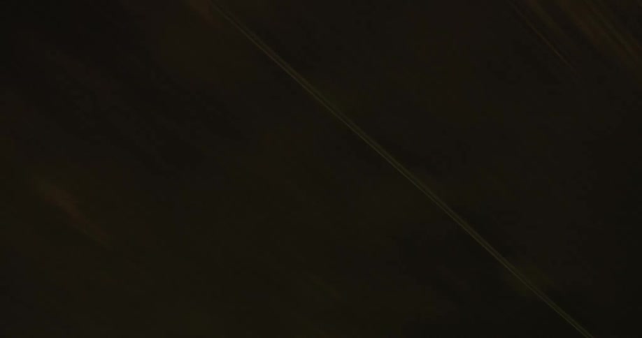 The ceiling of the tunnel has lights