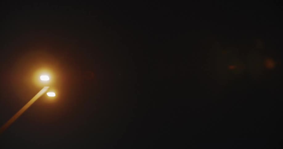 Streetlights in the dark of the sky