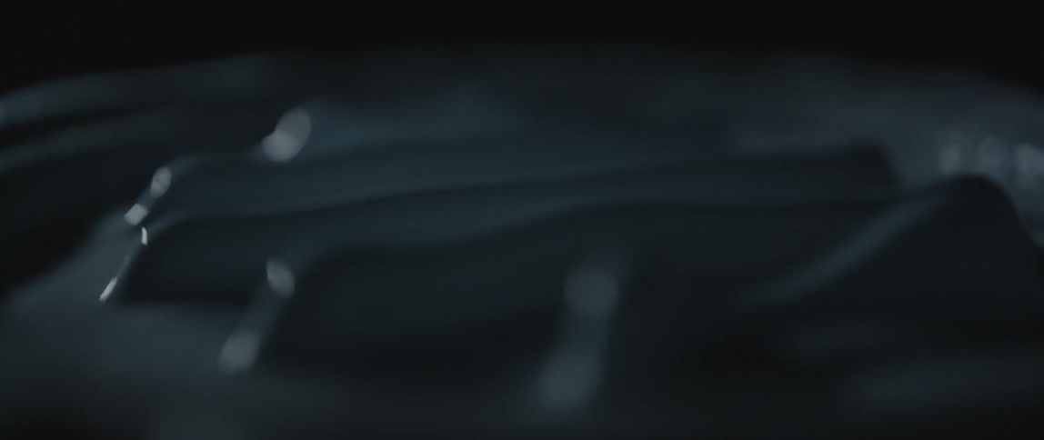 A close up view of a can of paint as it is vibrating