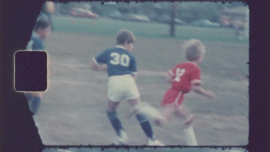 Soccer players compete on the field