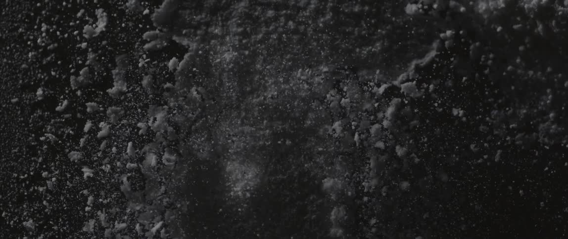 Dirt on the ground is being vibrated