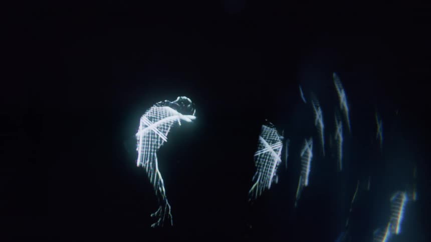 Graphics on a monitor of some blue bodies moving