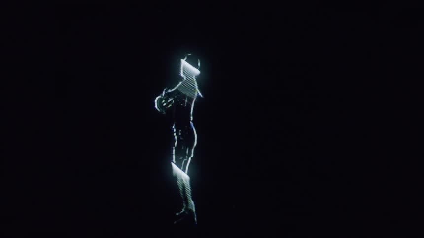 The lights flicker on the hologram of a woman dancing
