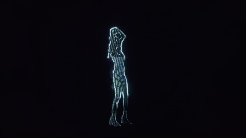 The hologram of a woman reaches her arms up while dancing
