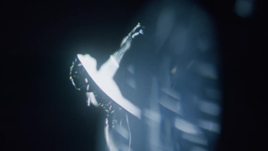 An hologram footage of a lady dancing