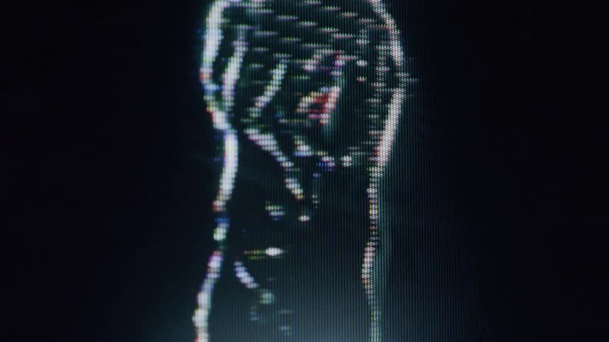 A glowing futuristic figure outlined in white light against a dark background resembling a holographic or digital representation of a person