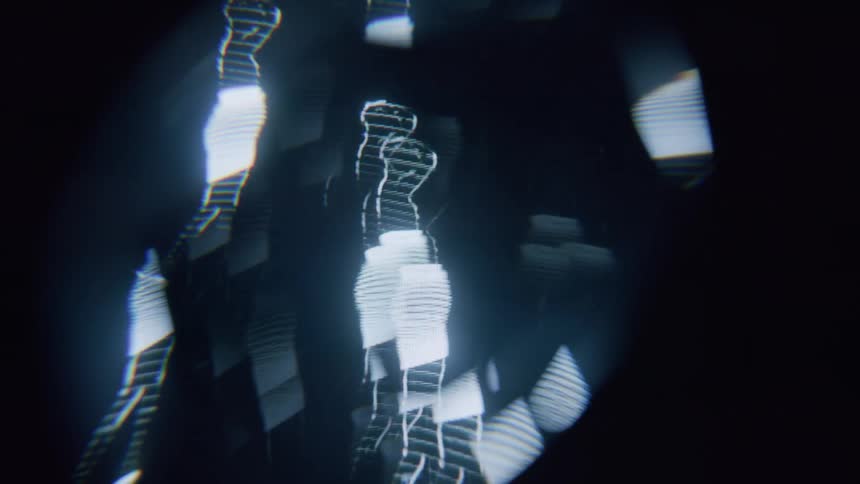 A hologram is of a woman dancing and it is mirrored all over