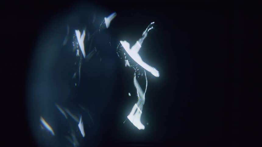 The hologram of the dancing woman waves her arms around