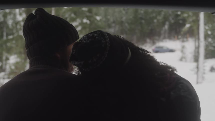 Girl resting her head on her boyfriends shoulder