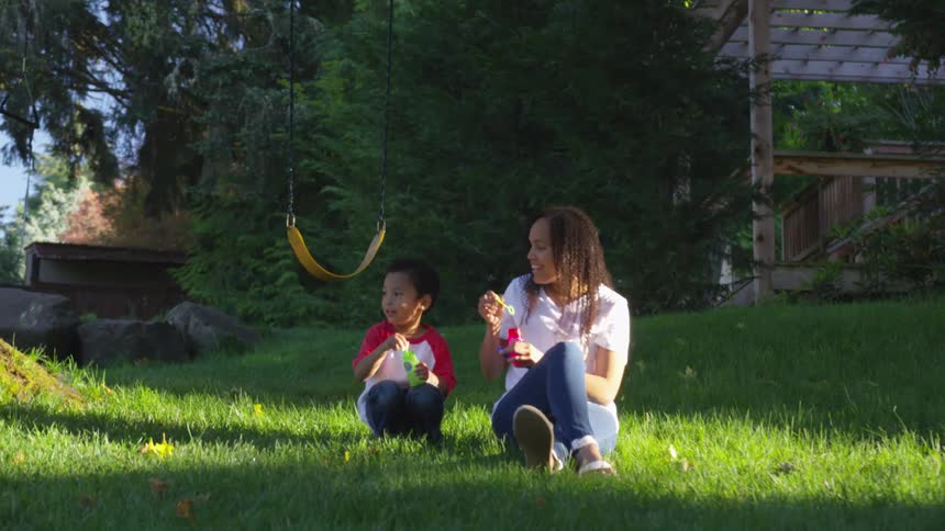 Mom and son making soap bubbles
