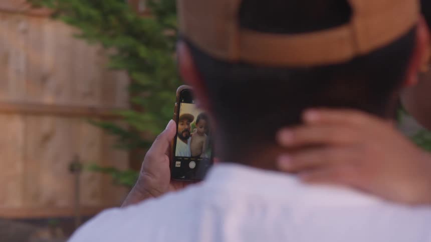 Close up of a smartphone of a family taking a selfie