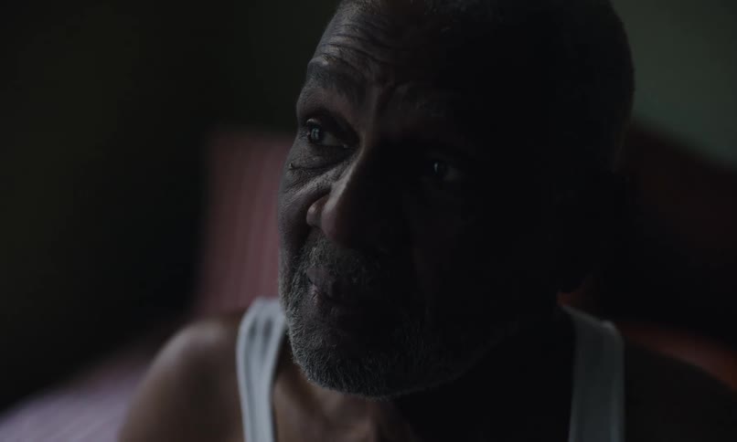 Man sitting in a room looking lost