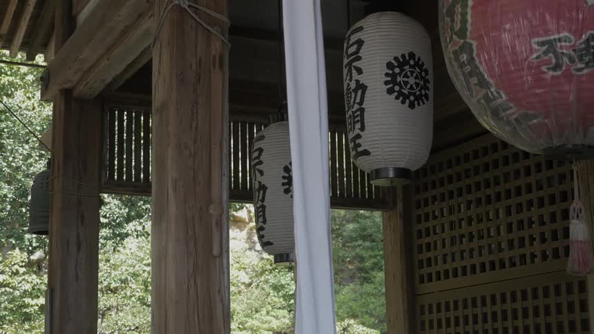 Paper lanterns line this house on a sunny day