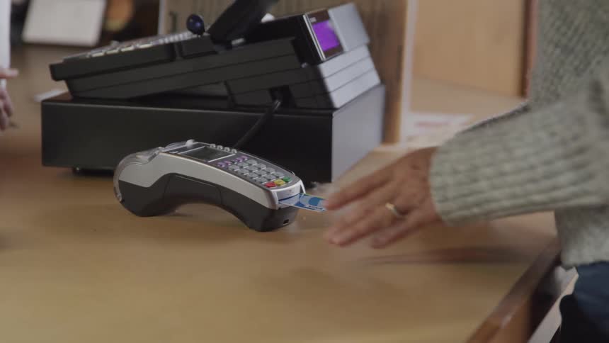 A footage of a person making use of a pos