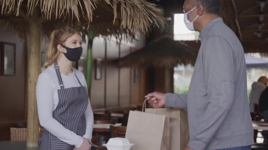 A footage of a person picking up a take away pack