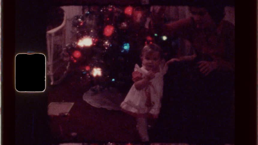 Little girl with her daddy at christmas