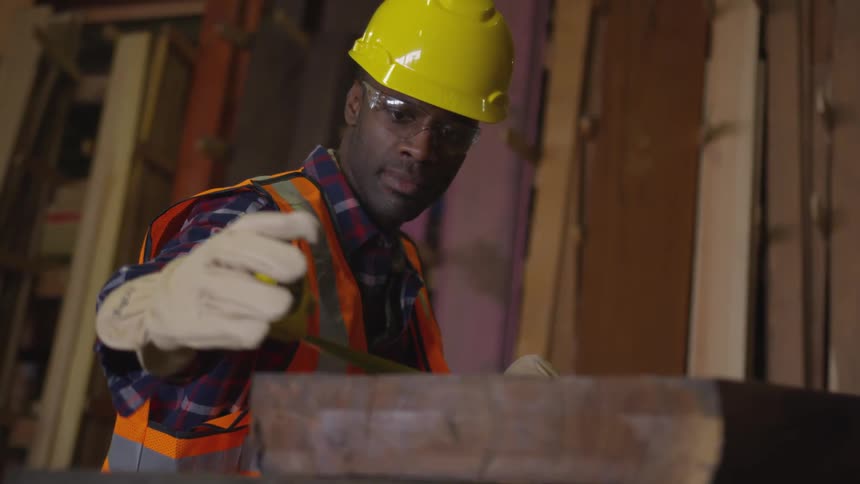 A footage of a carpenter working