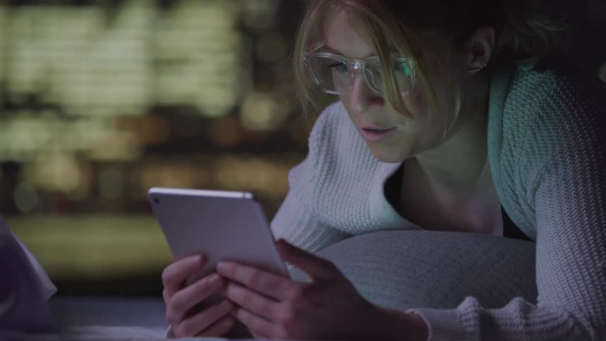 Woman has a video conversation on a tablet