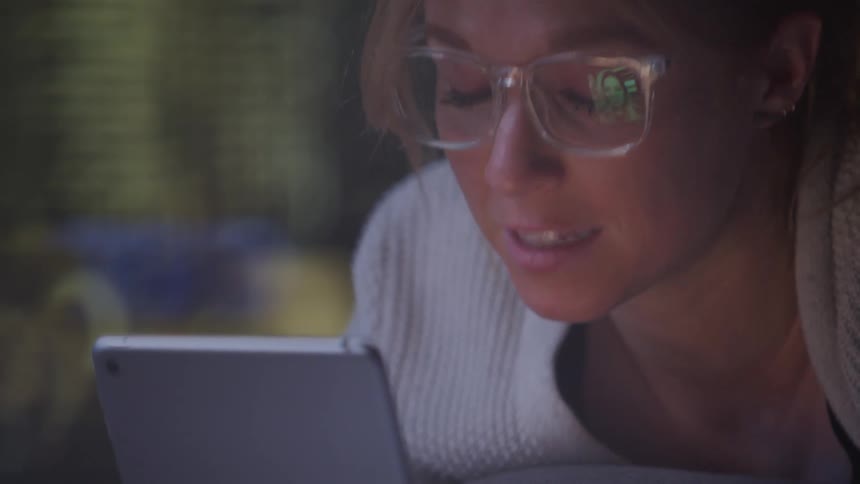 A footage of a person having a conversation on a tablet